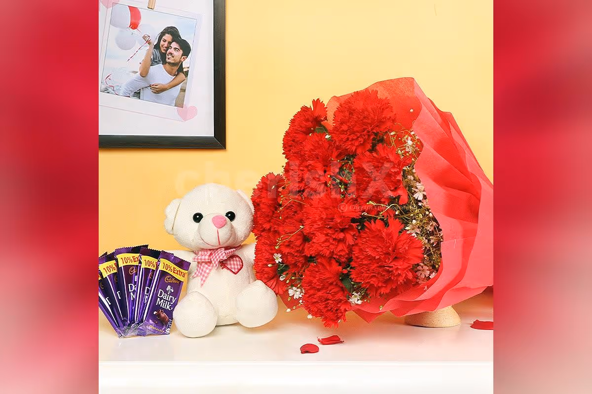 A Combo with 10 red carnations with 5 dairy milk chocolates and a 6' ft cute teddy.