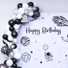 Foil balloons and star strings add a sparkle to each moment.