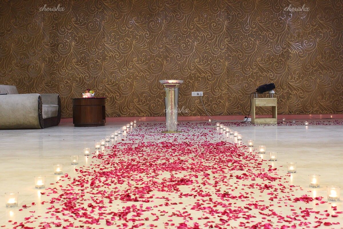 Path with candles and rose petals