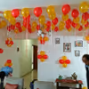Balloon decoration with hanging photos to celebrate your anniversary or other events at home