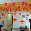 Balloon decoration with hanging photos to celebrate your anniversary or other events at home