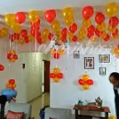 Balloon decoration with hanging photos to celebrate your anniversary or other events at home