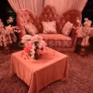 A gorgeous sofa set up in the cabana for a romantic date.