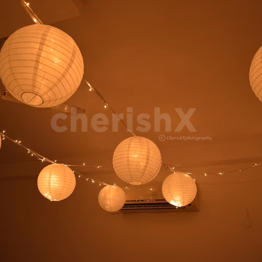 Decoration in Room with Lanterns and Fairy Lights.