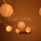 Decoration in Room with Lanterns and Fairy Lights.