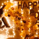 Decorations feel as if Balloons are flowing out of a Champagne