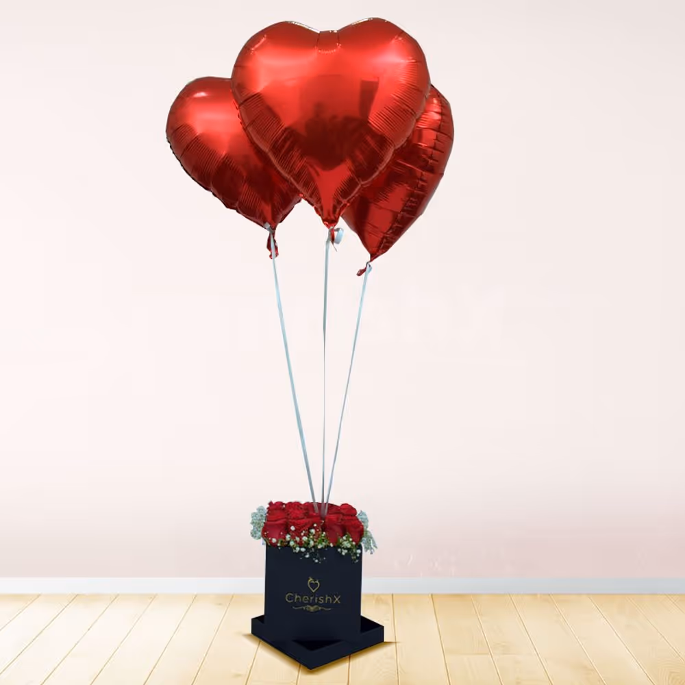 A Red Rose Bucket with heart balloons to shower love upon your close ones.