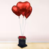 A Red Rose Bucket with heart balloons to shower love upon your close ones.
