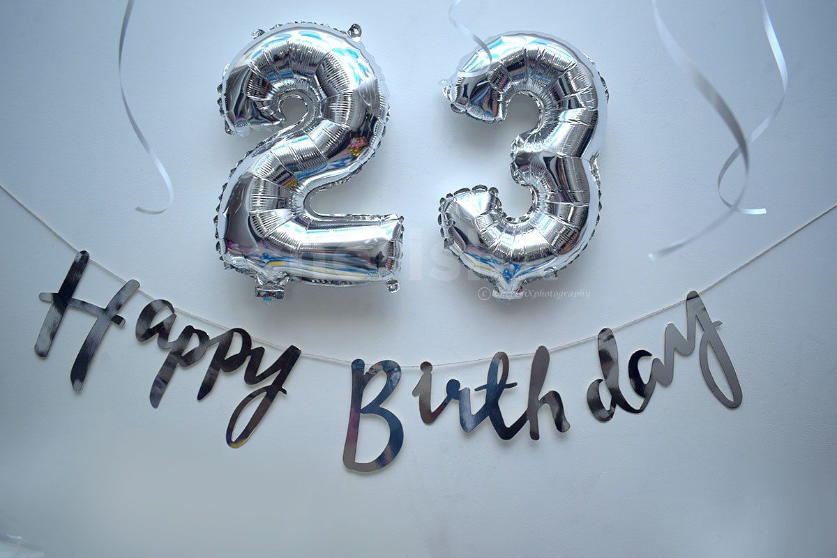 Silver number foil balloons and silver happy birthday bunting for Blue Themed Decor.