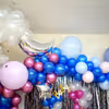 Exclusive Royal Baby Shower Decor with colourful balloons including blue, pink and white chrome and metallic balloons.