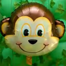 A monkey foil balloon to make it fun and realistic for your kid's birthday surprise.