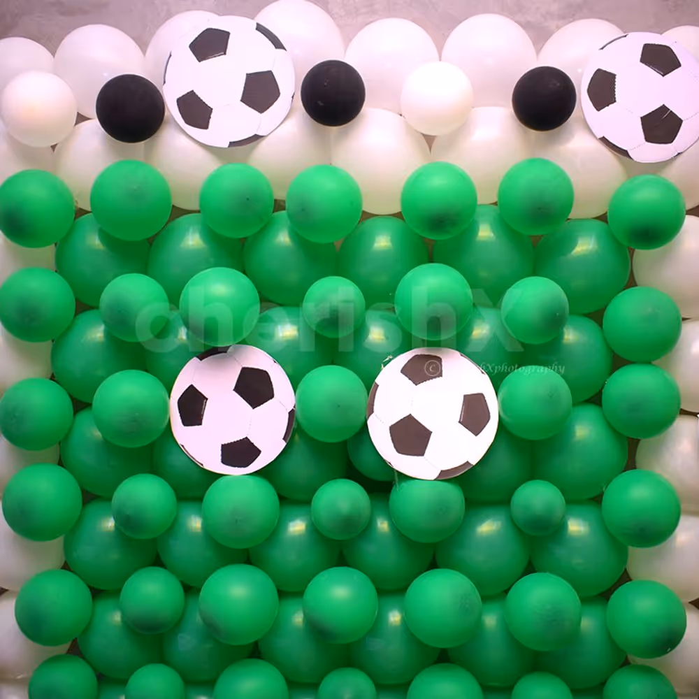 The wall decor is filled with bunches of balloons to enhance the overall look of the room decor.