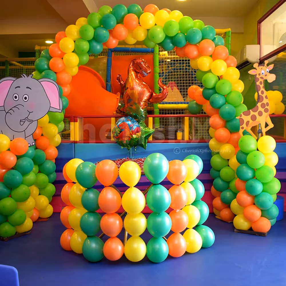 A dome-like structure made up of balloons with different colours to make the decor look attractive.