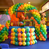 Bunches of balloons are used to make this whole photo booth.