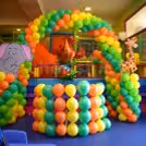 Bunches of balloons are used to make this whole photo booth.