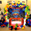 Book this fulfiling decor with balloons and superhero-themed cut-outs.