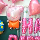 Foil Balloons of Peppa Pig to make the decor more realistic and lovely.