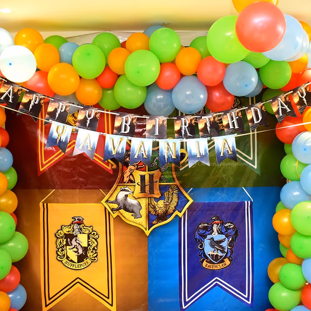 The Harry Potter Wall Decor with Harry Potter Themed Bunting and the four famous Houses in the Howgwarts.