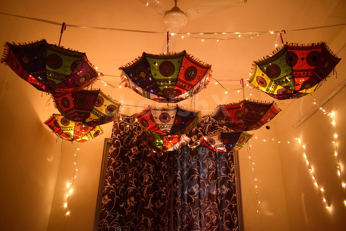 Add beauty with these embroidered umbrellas to your home.