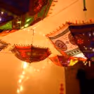 Umbrella decors along with lighting give the perfect festive vibes.