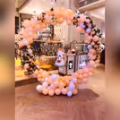 Colourful Round Balloon Backdrop to brighten up your celebration.