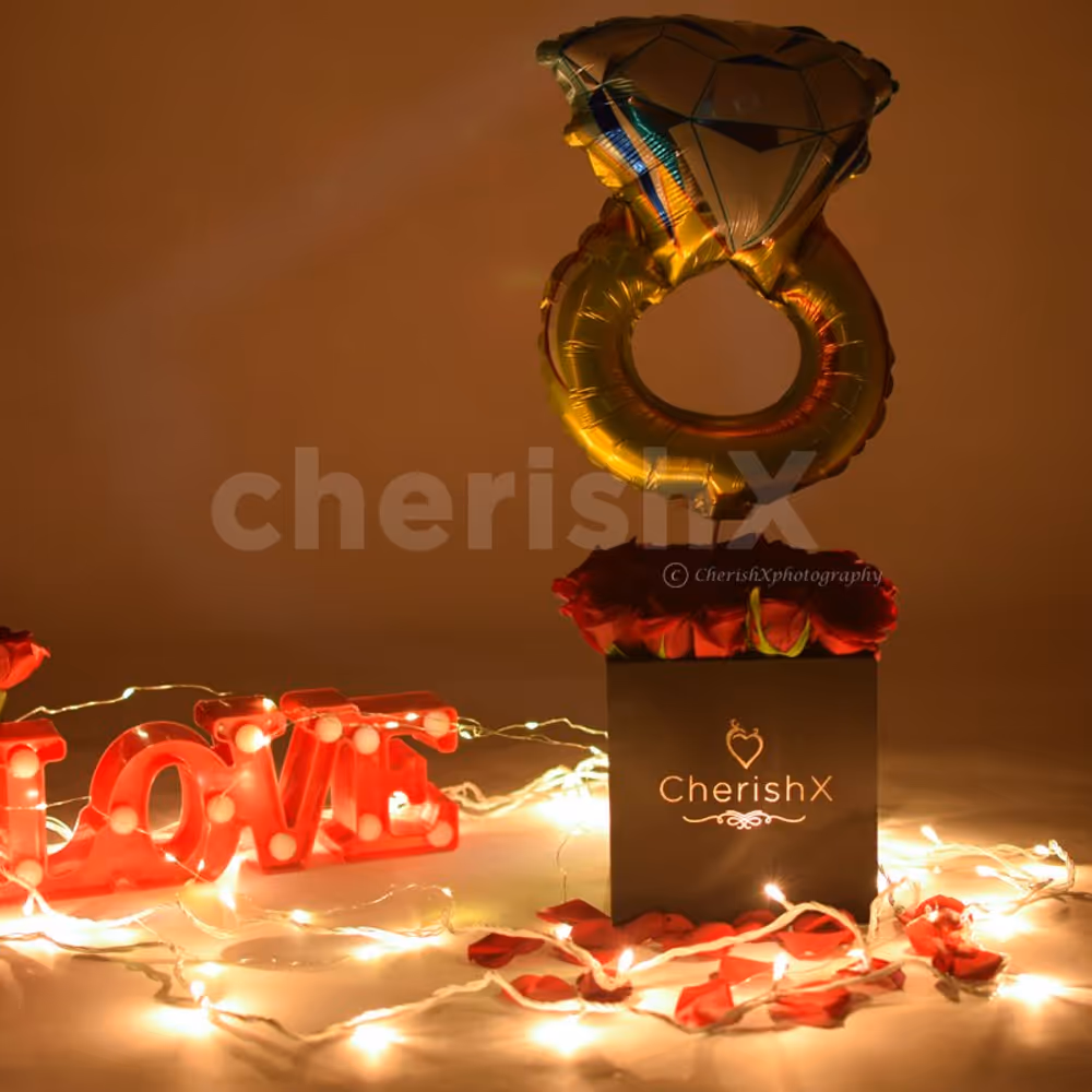 Book a Rose Bucket with a Ring Balloon for your special one.