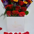 CherishX offers you a charming Rose bucket with chocolates to make his/her day.