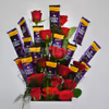 The chocolate and roses are arranged as a flower bouquet.