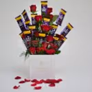 There are 15 roses and chocolates in this adorable bucket.