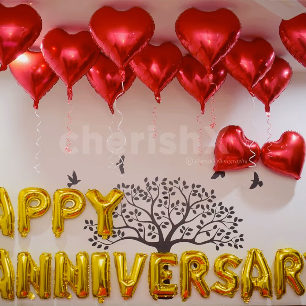 Happy Anniversary Foil Balloons and Heart-shaped foil Balloons used for making the decor romantic.