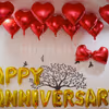Happy Anniversary Foil Balloons and Heart-shaped foil Balloons used for making the decor romantic.