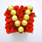Delightful Chocolate Initial Rose Bucket packed with sweet surprises.