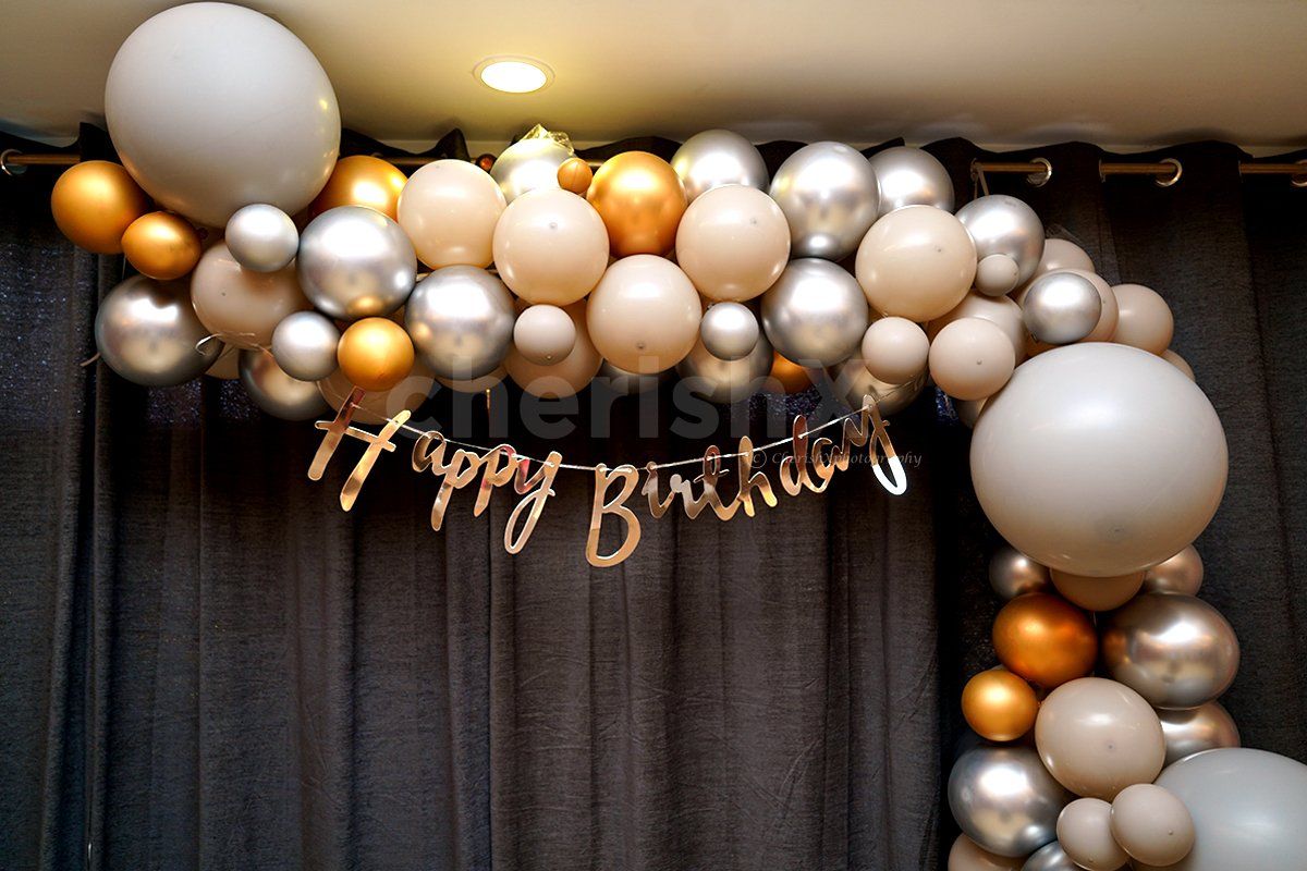 Balloon Arc, Chrome Balloons and Happy Birthday Bunting