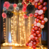 The Bridal Shower Decor with Balloon Arc on one side and Rosettes on the other.