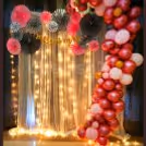 The Bridal Shower Decor with Balloon Arc on one side and Rosettes on the other.