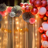 Bridal Shower Balloon Decoration with Balloons in Pink Shade and Rosettes.