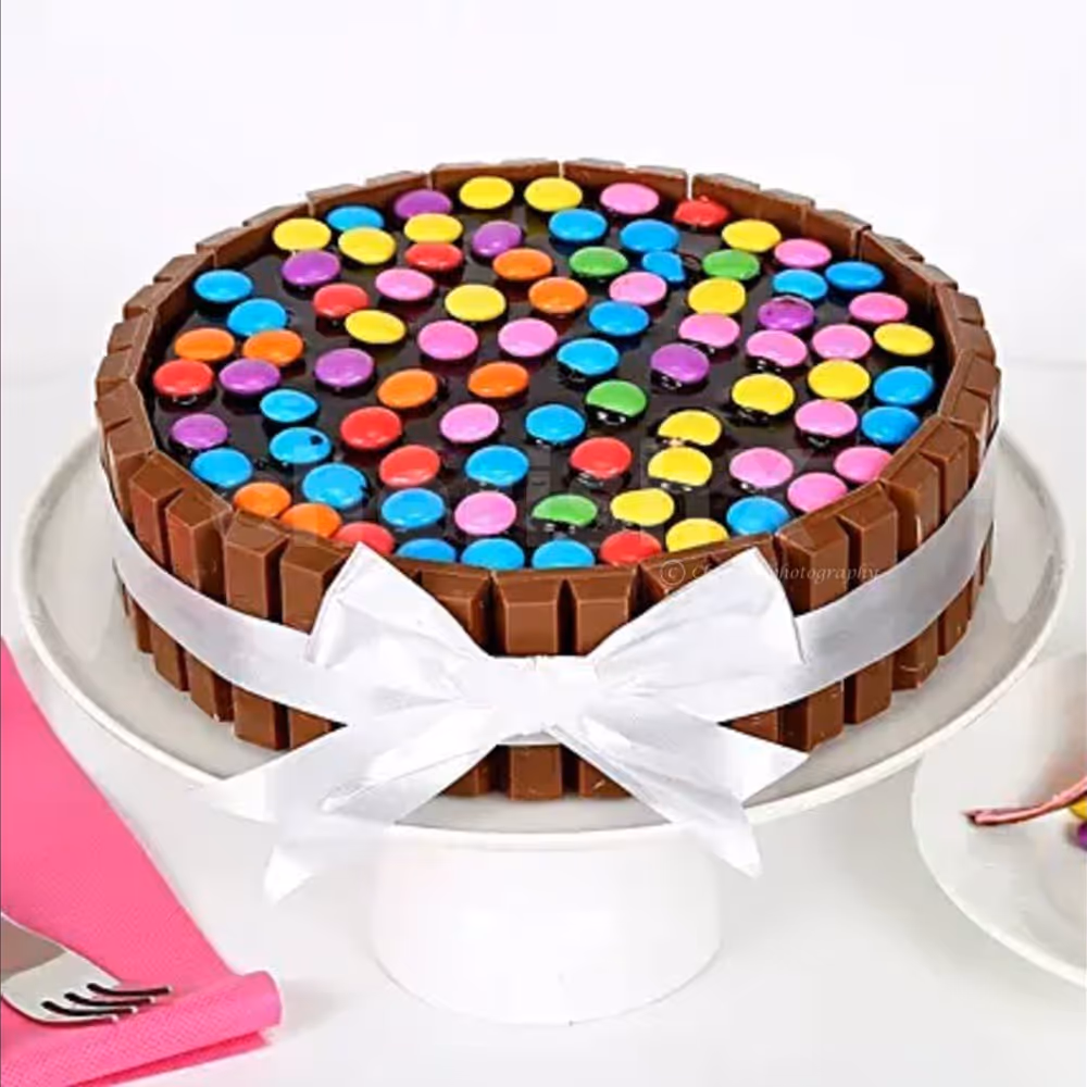 High rated and delicious kitkat gems cake delivered to your home