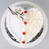 Home delivery of white forest heart shape cake