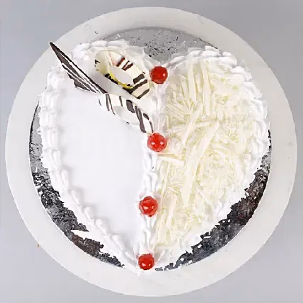 Home delivery of white forest heart shape cake