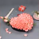 A Beautiful 50 Pink roses heart arrangement online delivery