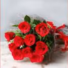 10 red rose bouquet and black forest cake (500 gms)