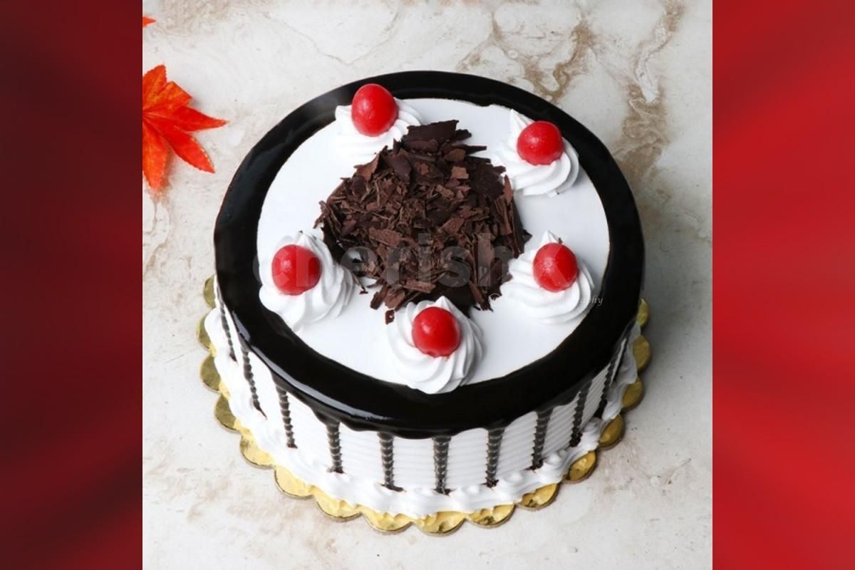 10 red rose bouquet and black forest cake home delivery