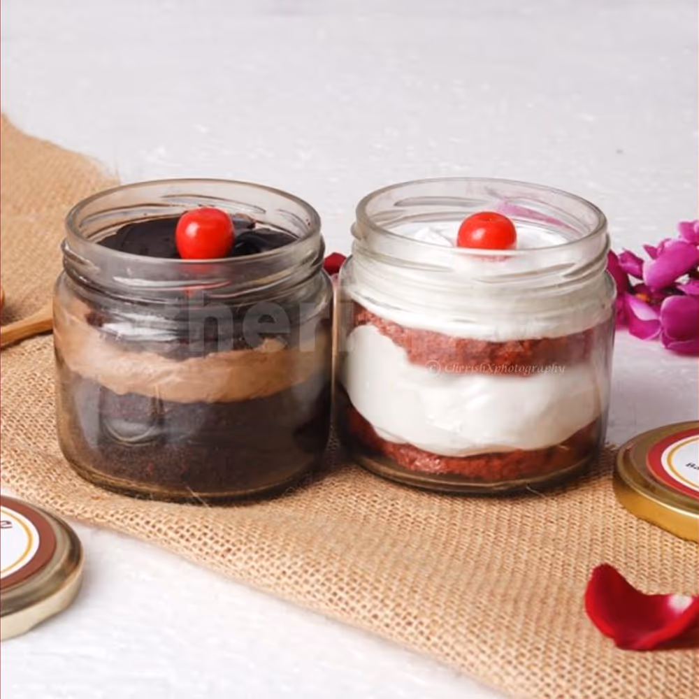 12 Red rose bouquet with 2 cake jars - red velvet and chocolate truffle flavors home delivery