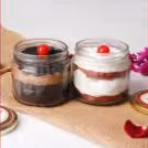 12 Red rose bouquet with 2 cake jars - red velvet and chocolate truffle flavors home delivery