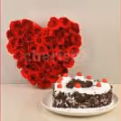 50 Red roses heart arrangement and a heart shape black forest cake home delivery