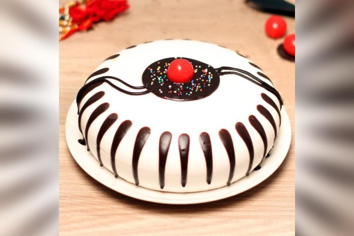 Choco vanilla cake with rakhi home delivery