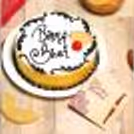 Delicious Rakhi and Pineapple Punch Cake (Half Kg) delivered fresh at your doorstep.
