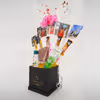 A charming bucket arranged in a beautiful way with different little gifts.