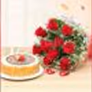 Red roses with a butterscotch cake