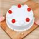 Vanilla cake with pink roses home delivery by cherishx